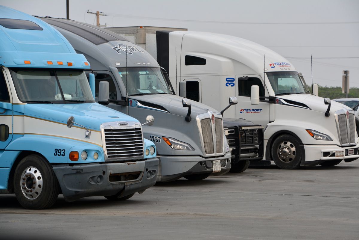 Row of prime mover trucks